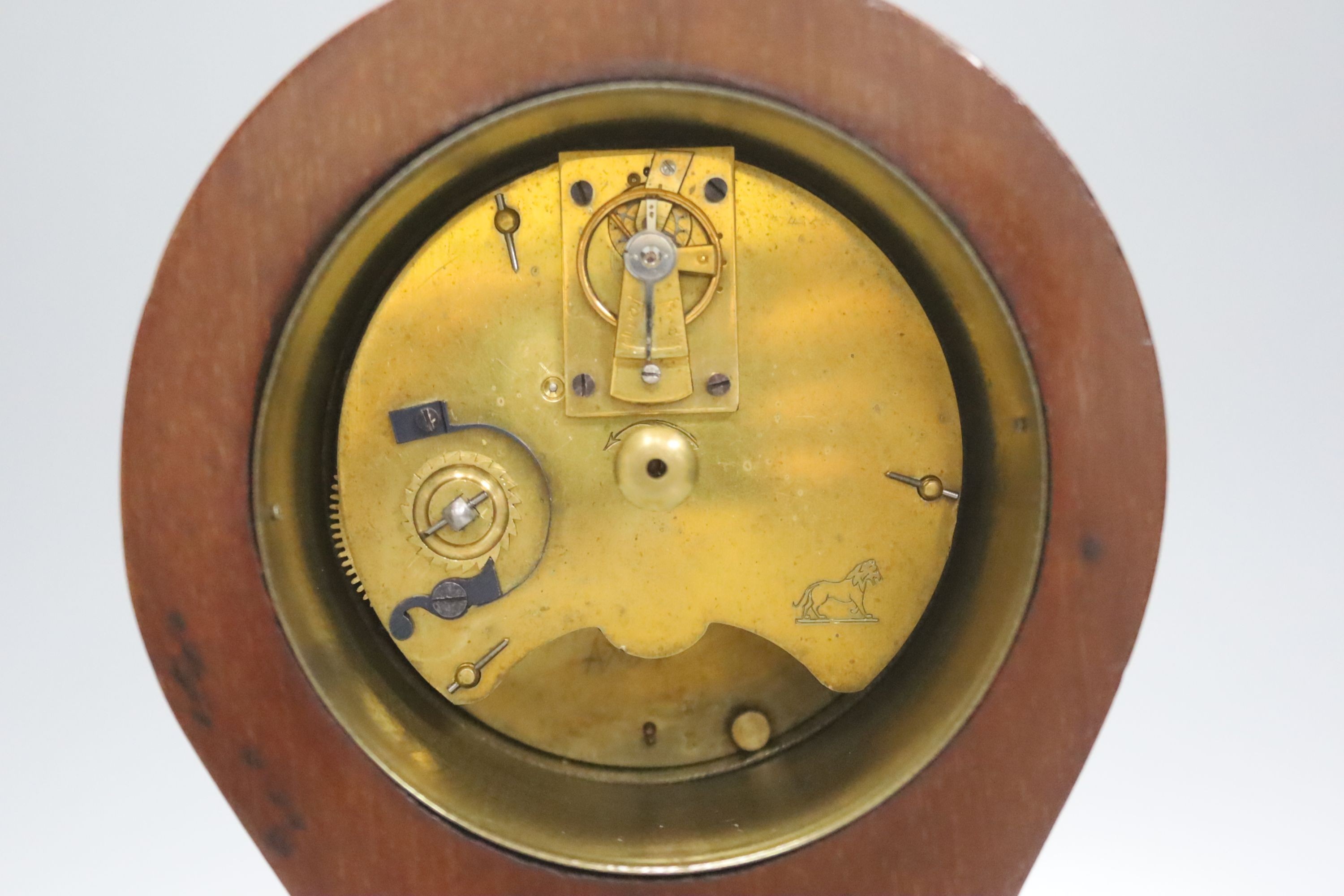 An Edwardian inlaid mahogany balloon cased timepiece, height 24cm